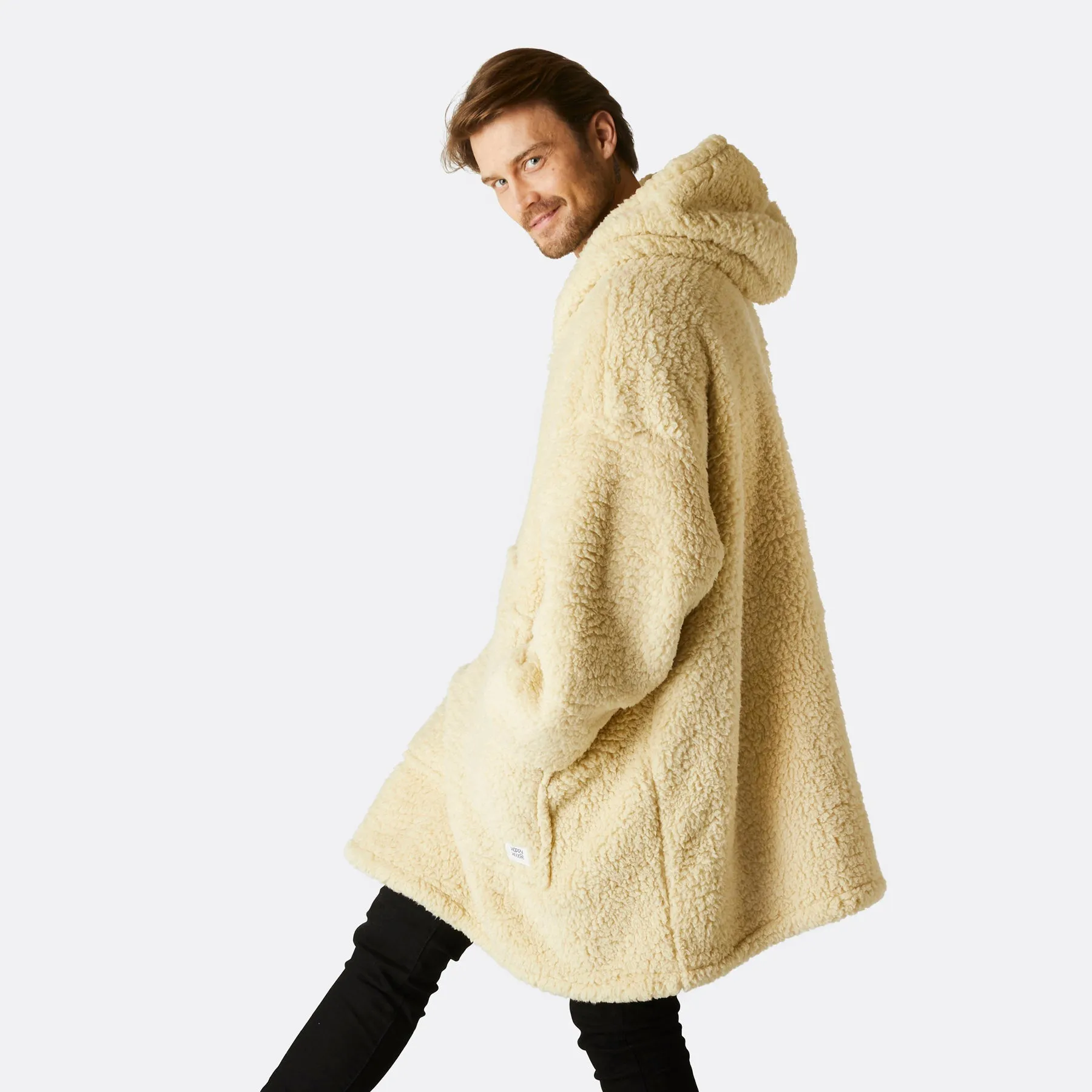 Sure! The optimized title for this e-commerce product could be Cozy Beige Sherpa HappyHoodie.