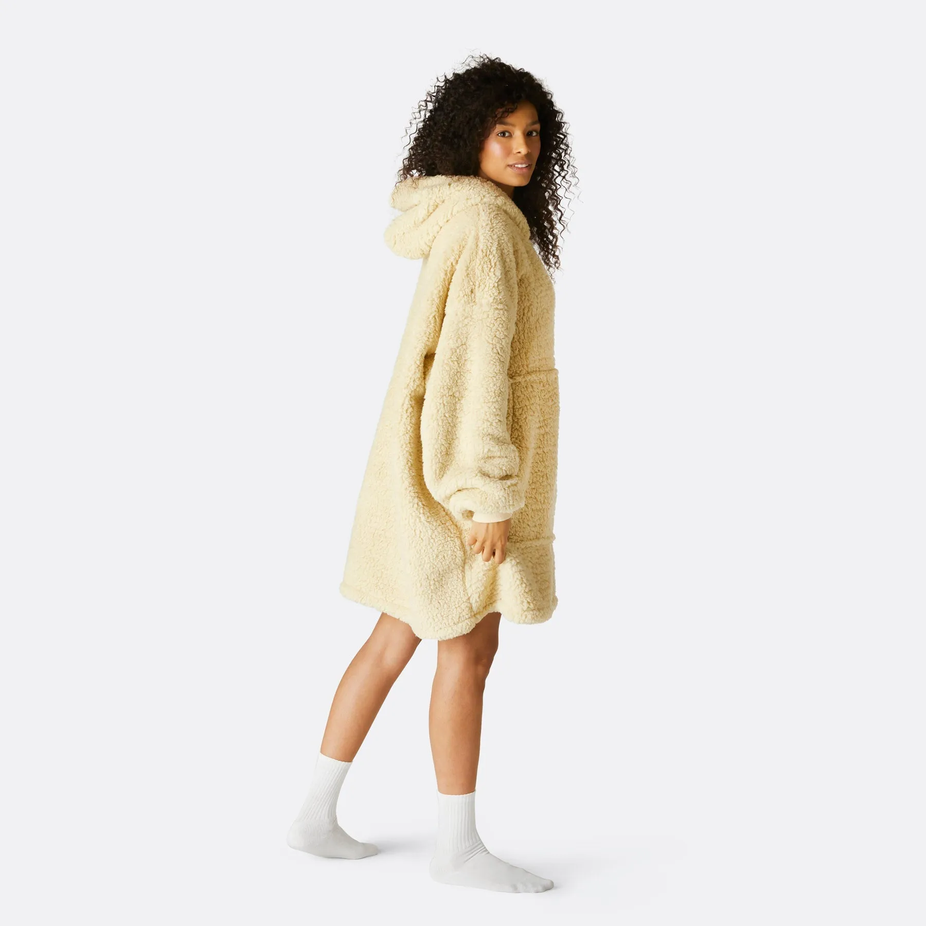 Sure! The optimized title for this e-commerce product could be Cozy Beige Sherpa HappyHoodie.